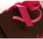 Luxury paper bags with attached ribbon